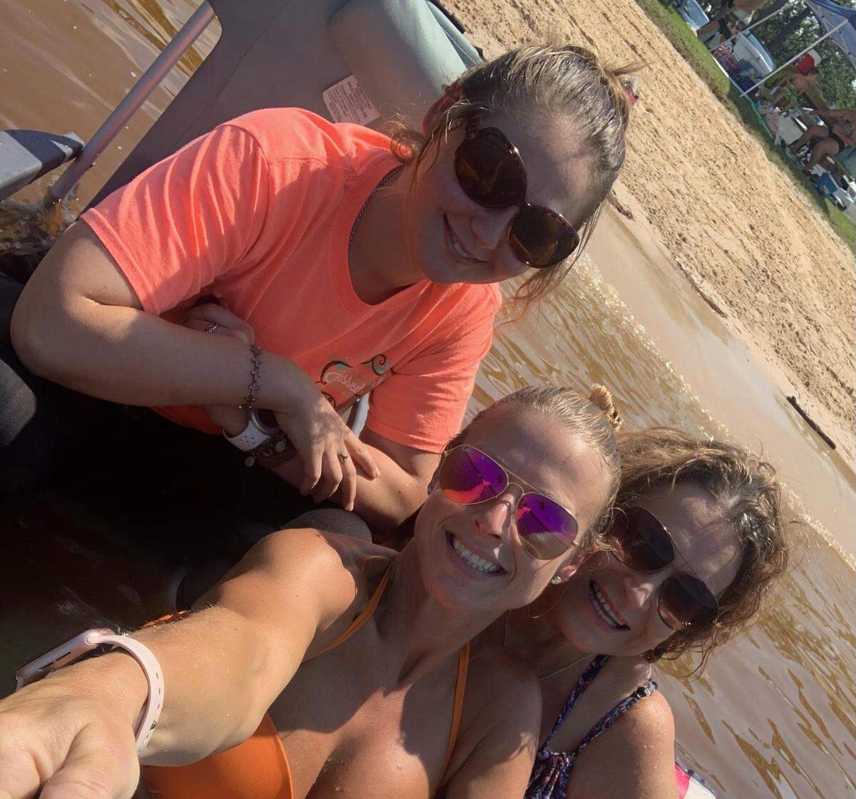 Days before she got sick, Elaine McRae, right, enjoyed a lake trip with grandaughter Sara Mizell, left, and daughter Allyson Nulta. Daughter Monica Erwin went on the outing with them but is not pictured.