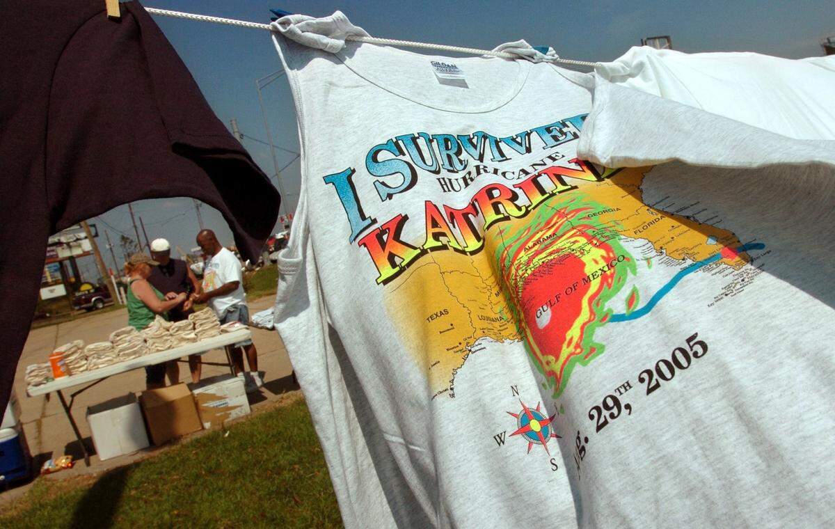 ’I Survived Hurricane Katrina’ T-shirts fly in the breeze, waiting to be sold along U.S. Highway 49 in Gulfport, MS on Wednesday, Sept. 21, 2005. Since the shirts began popping up along roads in and around Biloxi and Gulfport, some view the shirts as insensitive while others see them as a way to remember the catastrophic storm that battered the Gulf Coast some three weeks ago.