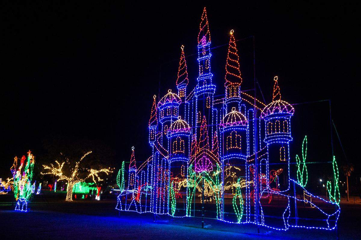A castle illuminated with Christmas lights during the Harbor Lights Winter Festival at Jones Park in Gulfport on Thursday, Dec. 2, 2021.