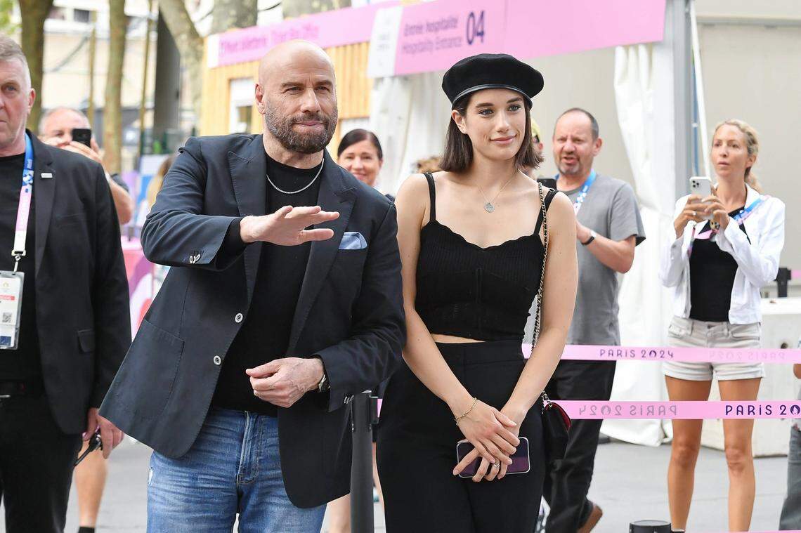 John Travolta and Ella Blue Travolta attend the Olympic Games in Paris on August 3, 2024.