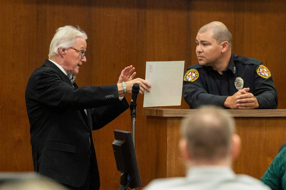 Mount’s attorney Jim Davis questions police officer Eli Humphrey on the witness stand during day one of the trial of Johnny Max Mount for the 2015 murder of Julie Brightwell in Harrison County Court in Biloxi on Tuesday, June 13, 2023.