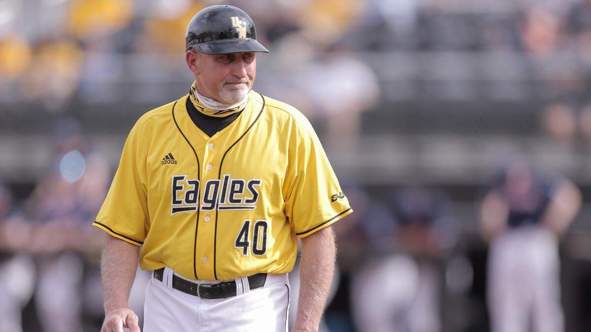 Southern Miss head baseball coach Scott Berry heads back to the dugout during the Golden Eagles’ game against UConn at Pete Taylor Park Saturday, February 27, 2021, in Hattiesburg.