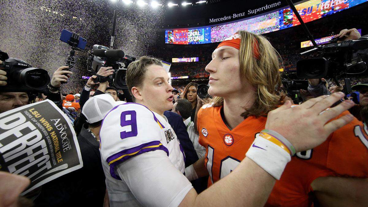 Joe Burrow #9 of the LSU Tigers talks with Trevor Lawrence #16 of the Clemson Tigers after their 42-25 win over Clemson Tigers in the College Football Playoff National Championship game at Mercedes Benz Superdome on January 13, 2020 in New Orleans, Louisiana. (Chris Graythen/Getty Images)