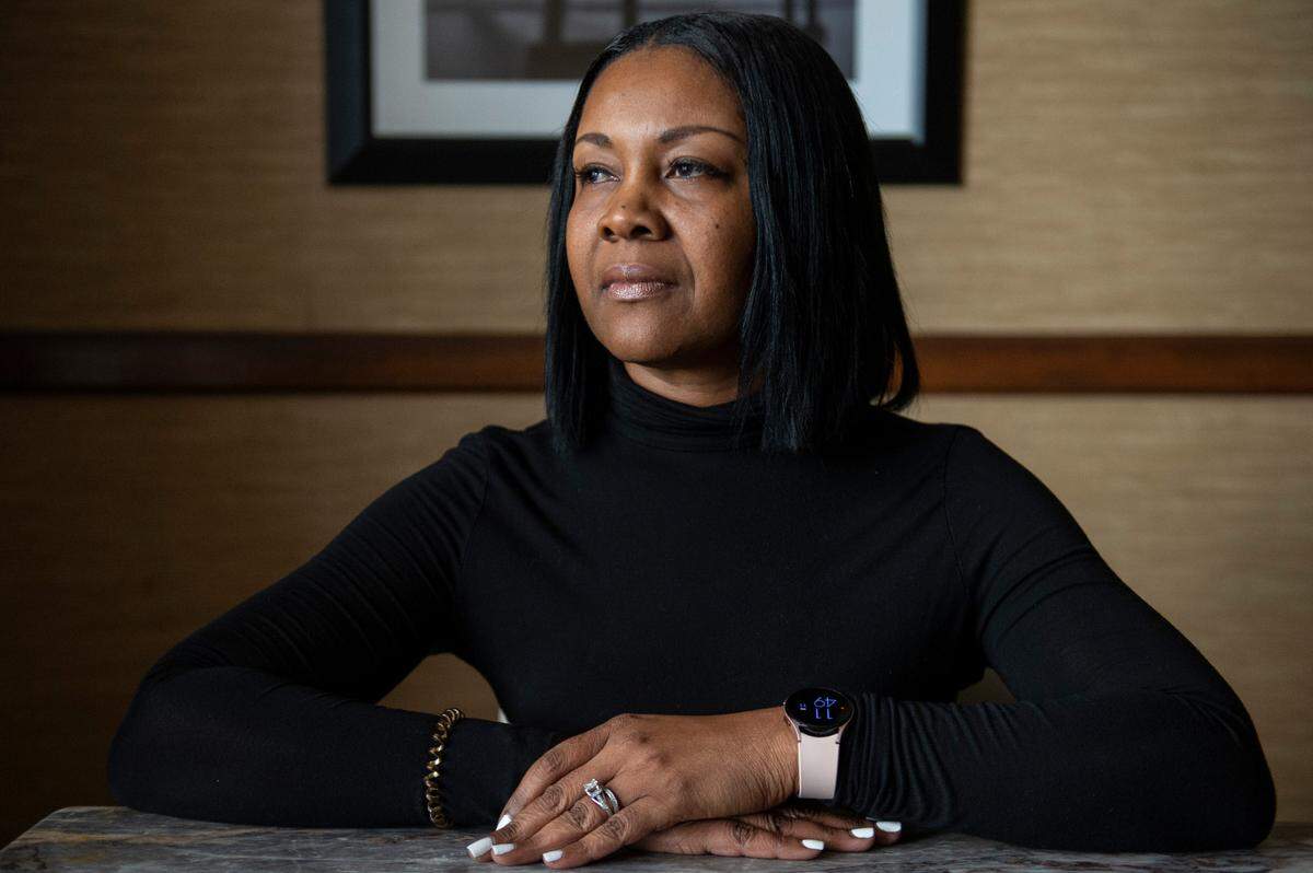 Tammy Carney, a paralegal who lives in Biloxi, poses for a portrait at her office in Gulfport on Friday, Feb. 11, 2022. Carney sued Oscar Renda after her car was damaged during the infrastructure project and won a settlement in a default judgment because Oscar Renda didn’t show up to court.