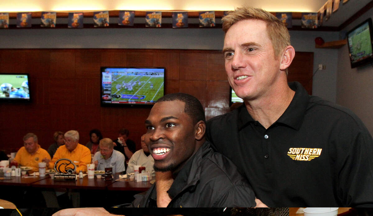 Southern Miss offensive coordinator Blake Anderson kids with tight end Jonathan Massey at Mugshots in Biloxi in 2010 during his previous stint in Hattiesburg.