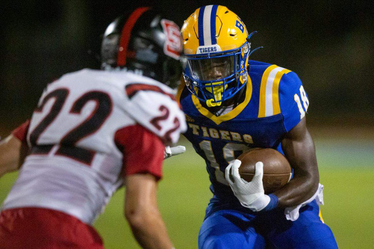 Bay High’s Benny Williams runs the ball during a game against St. Stanislaus at Bay High in Bay St. Louis on Friday, Sept. 1, 2023.