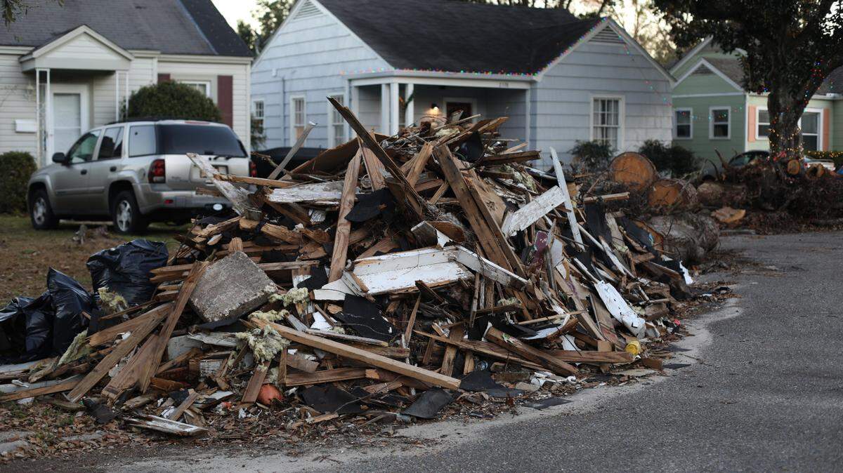 Piles of debris, downed trees and rubble line the Broadmoor neighborhood in Gulfport nearly two months after Hurricane Zeta hit South Mississippi.