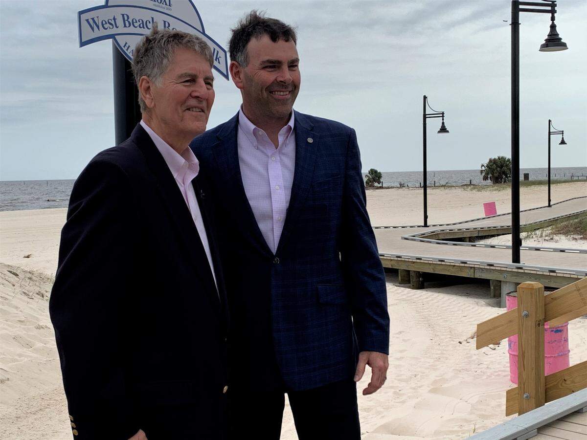 Biloxi Mayor Andrew “FoFo” Gilich, left, and Secretary of State Michael Watson, attended the ribbon cutting Wednesday, April 7, 2021, for phase II of the West Biloxi Boardwalk. The city and state are in court over a pier near there at Veterans Avenue.