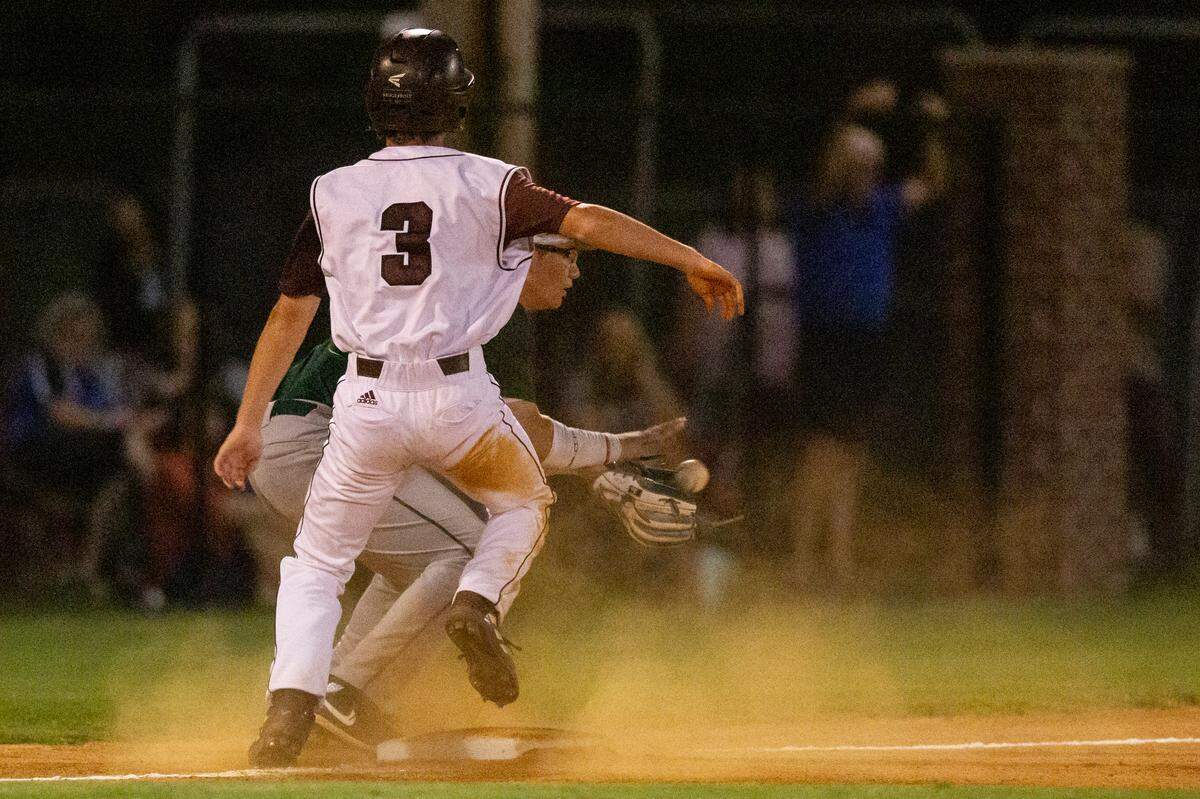 East Central’s Eli Smith makes it to third base safely in the 5A South State championship game at East Central High School in Hurley on Tuesday, May 23, 2023.