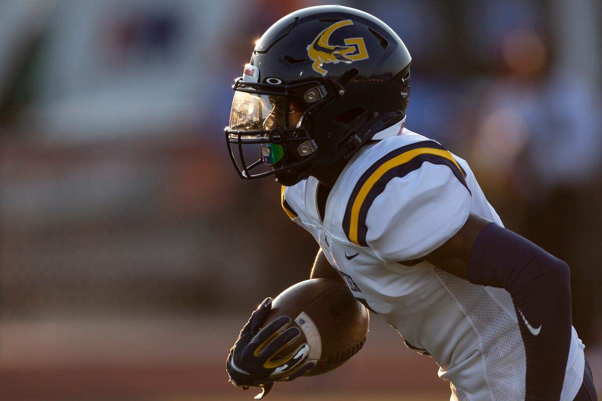 Gautier’s Kelvin Beavers runs the ball down the field during a Jamboree game at Biloxi High School on Friday, Aug. 18, 2023.