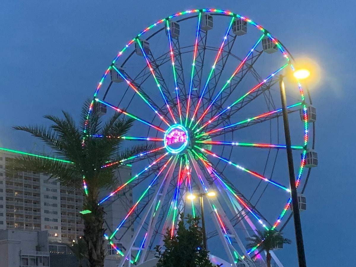 A colorful welcome to East Biloxi is the Ferris wheel at Margaritaville Resort Biloxi. The observation wheel is one of 15 rides coming at Paradise Pier Fun Park.