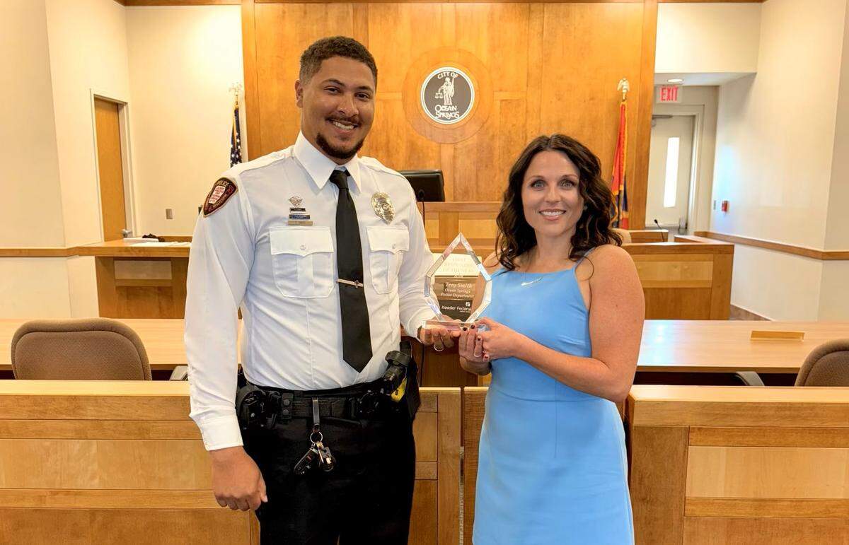 Ocean Spring Police Department Officer Trey Smith&nbsp;and Keesler Federal’s Community Development Officer Samantha Bignell&nbsp;