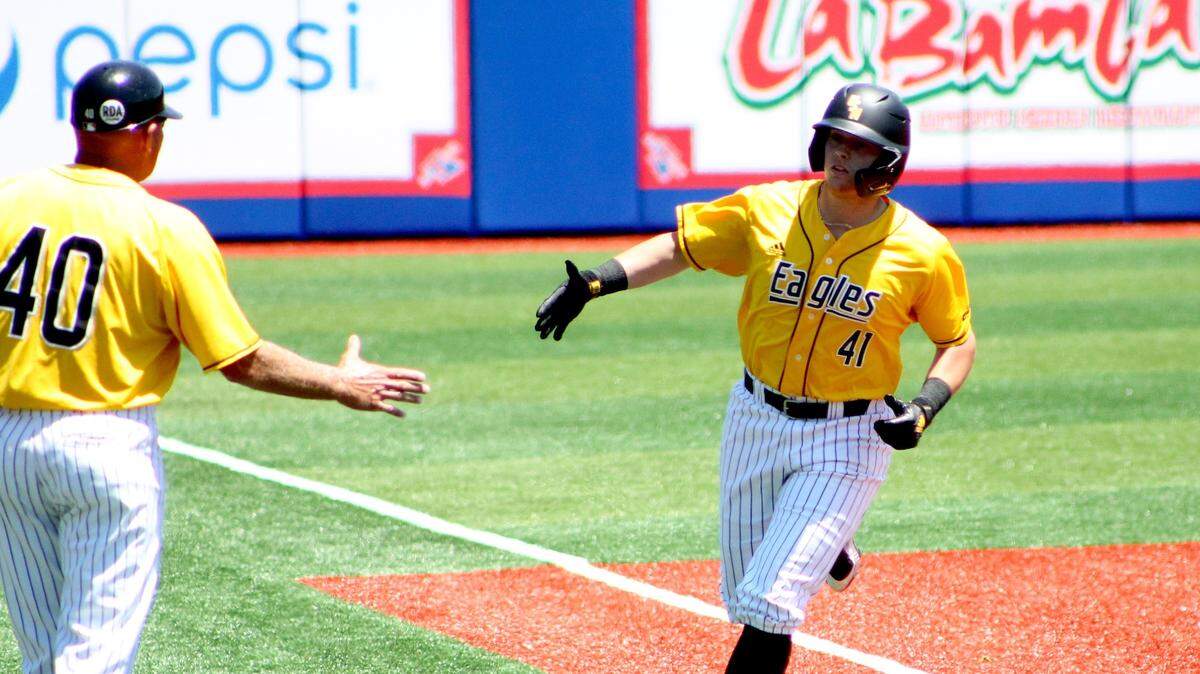 Southern Miss first baseman Christopher Sargent, right, is congratulated by coach Scott Berry following his first homer of the day in the third inning on Saturday, May 29, 2021 in Ruston, Louisiana.