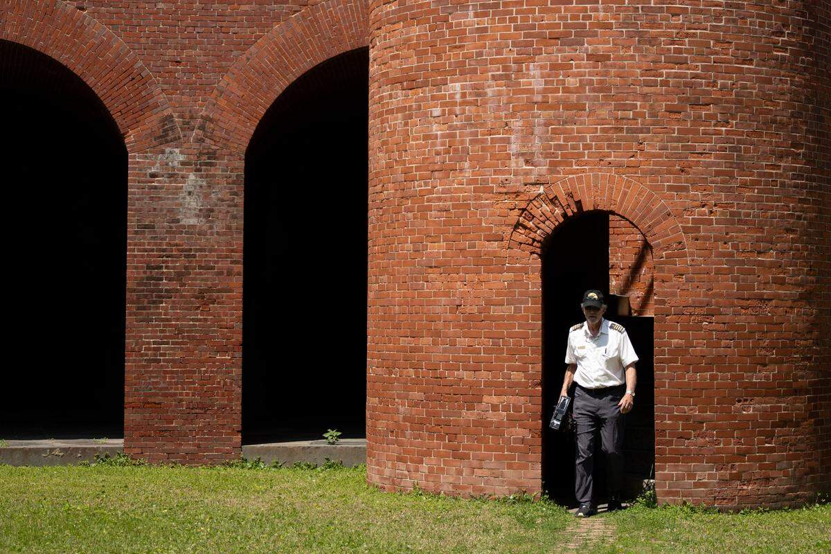 Capt. Louis Skrmetta walks out of a tower at Fort Massachusetts during an excursion to Ship Island on Wednesday.