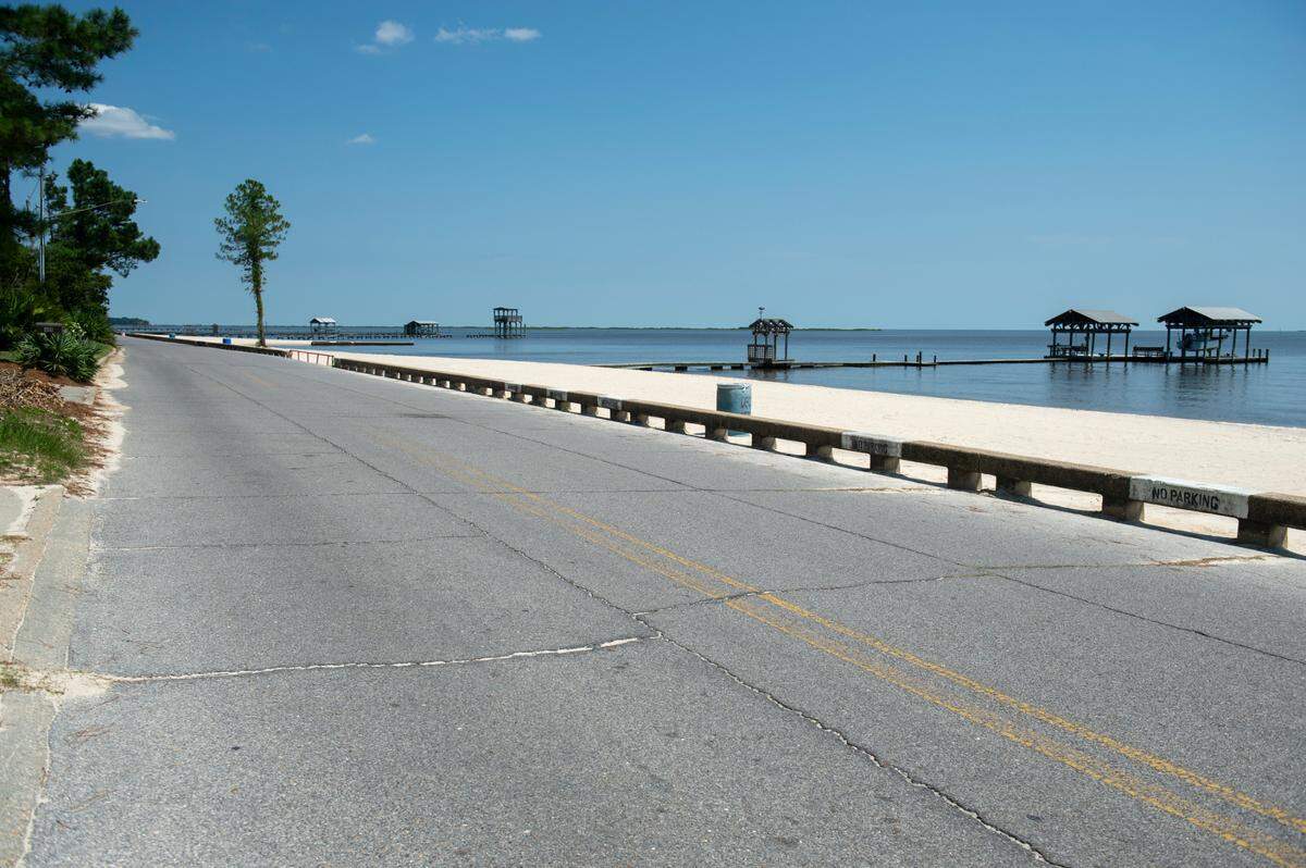 East Beach and East Beach Drive in Ocean Springs on Tuesday, June 11, 2024. East Beach Drive currently has limited parking options and no sidewalks.