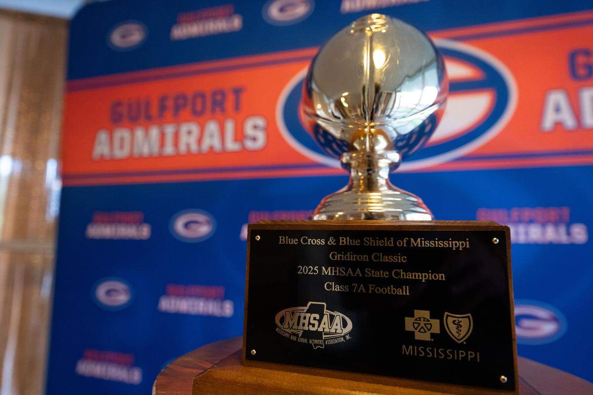 The 7A football state championship trophy is put on display during a presentation of the football state champion rings.