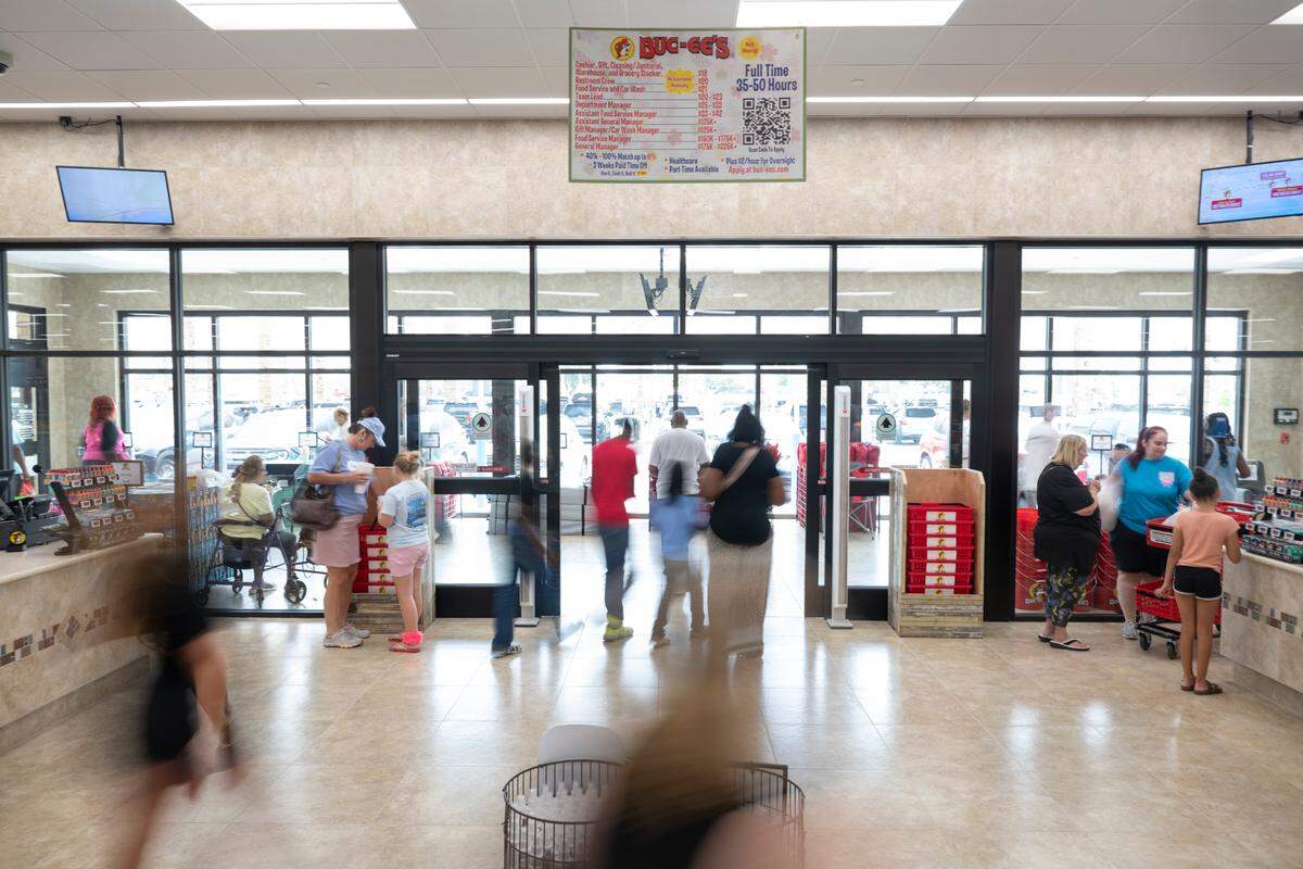 Customers shop during opening day of Buc-ee’s first Mississippi location in Harrison County on Monday, June 9, 2025.