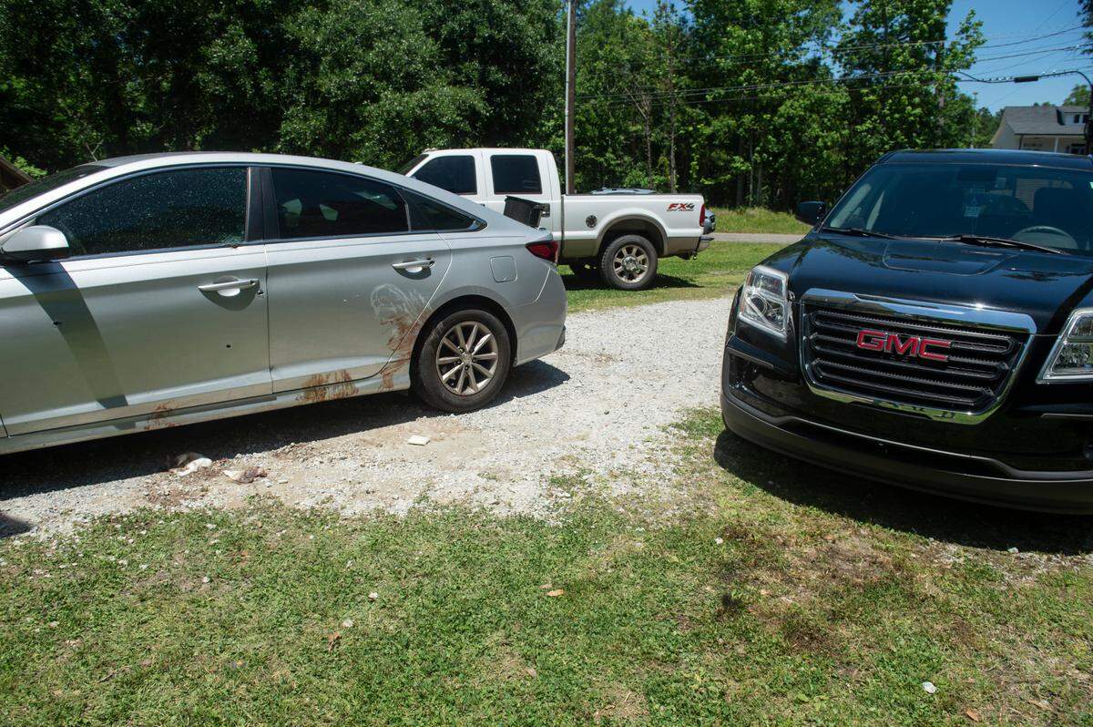 Blood and bullet holes at the scene of a shooting at an after-prom party on Sunday, April 30, 2023, in Bay St. Louis. Two teens were killed in the shooting and four were injured.