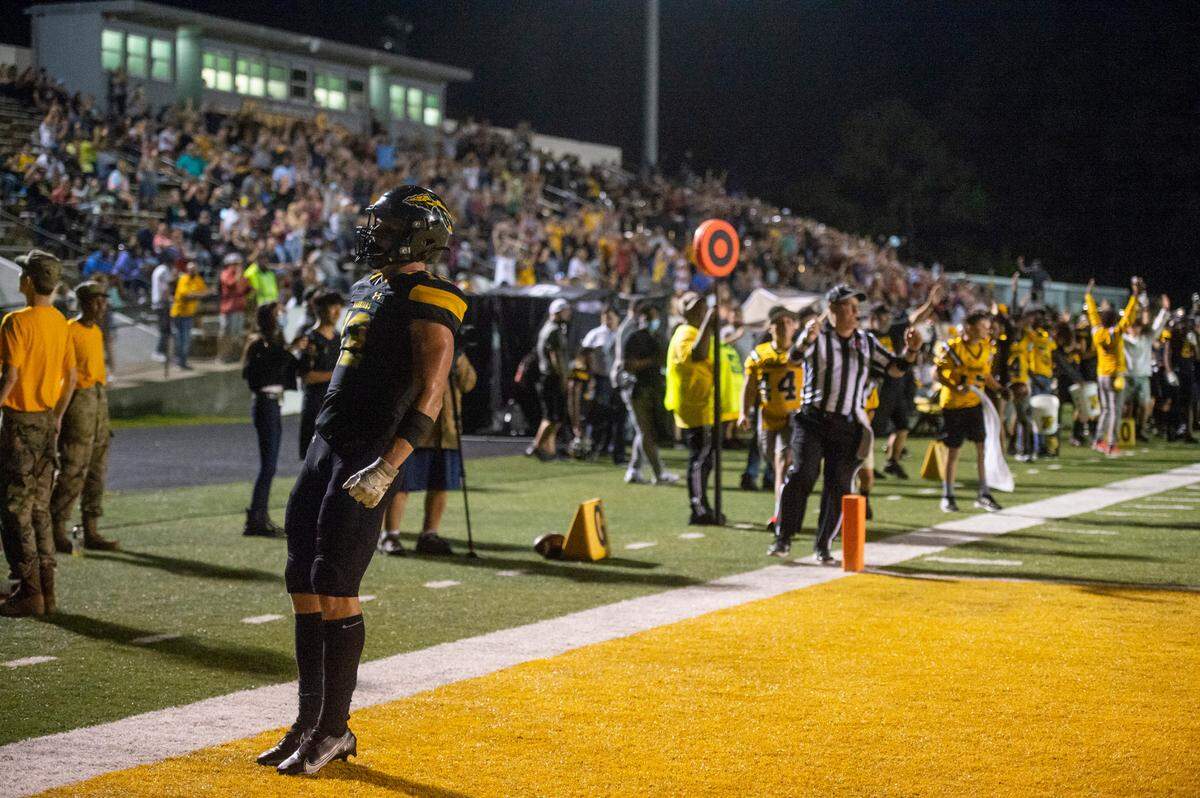 D’Iberville’s Colton Deshazo stands in the end zone after scoring a touchdown during the D’Iberville versus Picayune game at D’Iberville Stadium on Friday, Sept. 17, 2021.