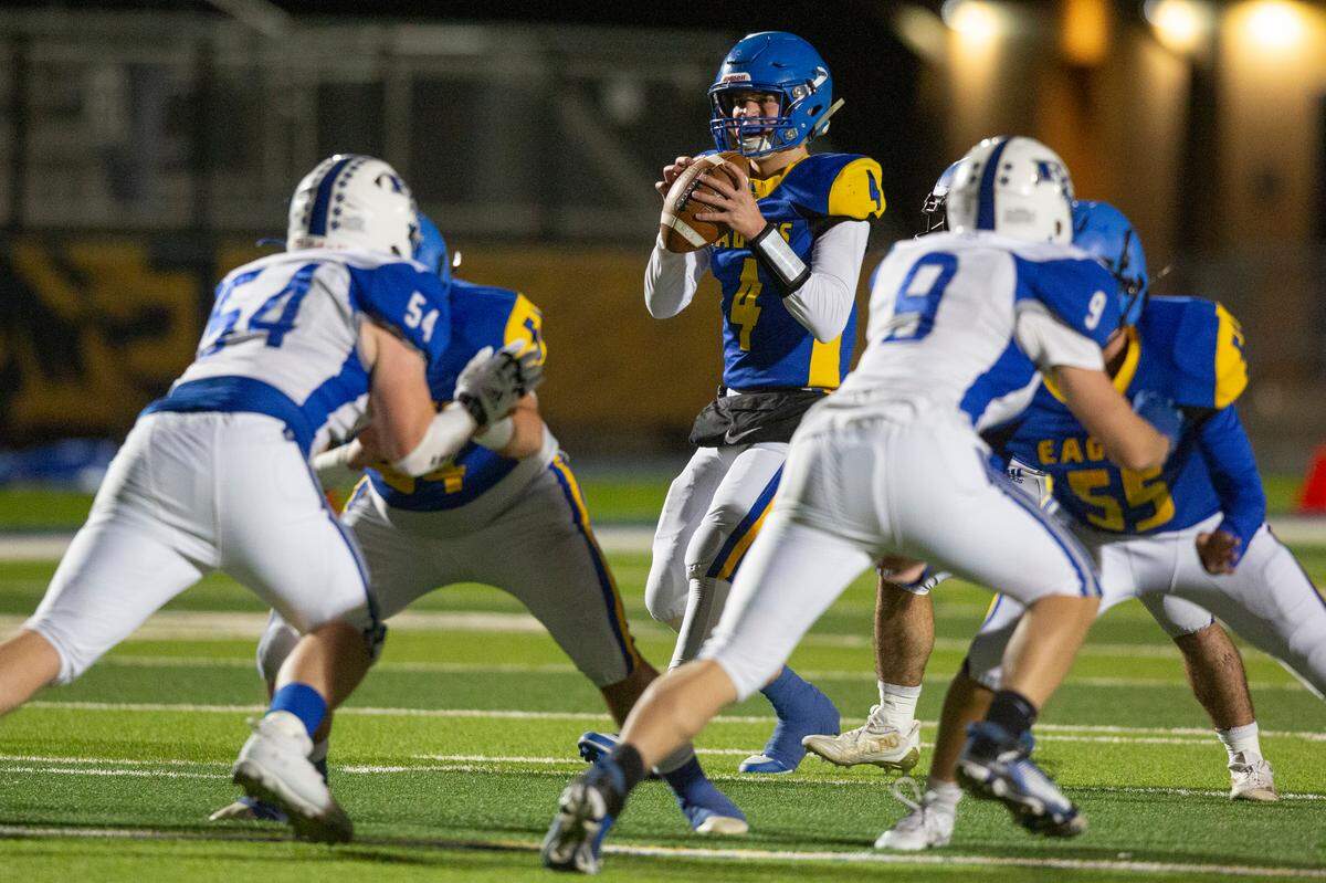 Resurrection quarterback Luke Schnoor looks to throw a pass during a game against French Camp Academy at Gautier High School in Gautier on Friday, Nov. 3, 2023.