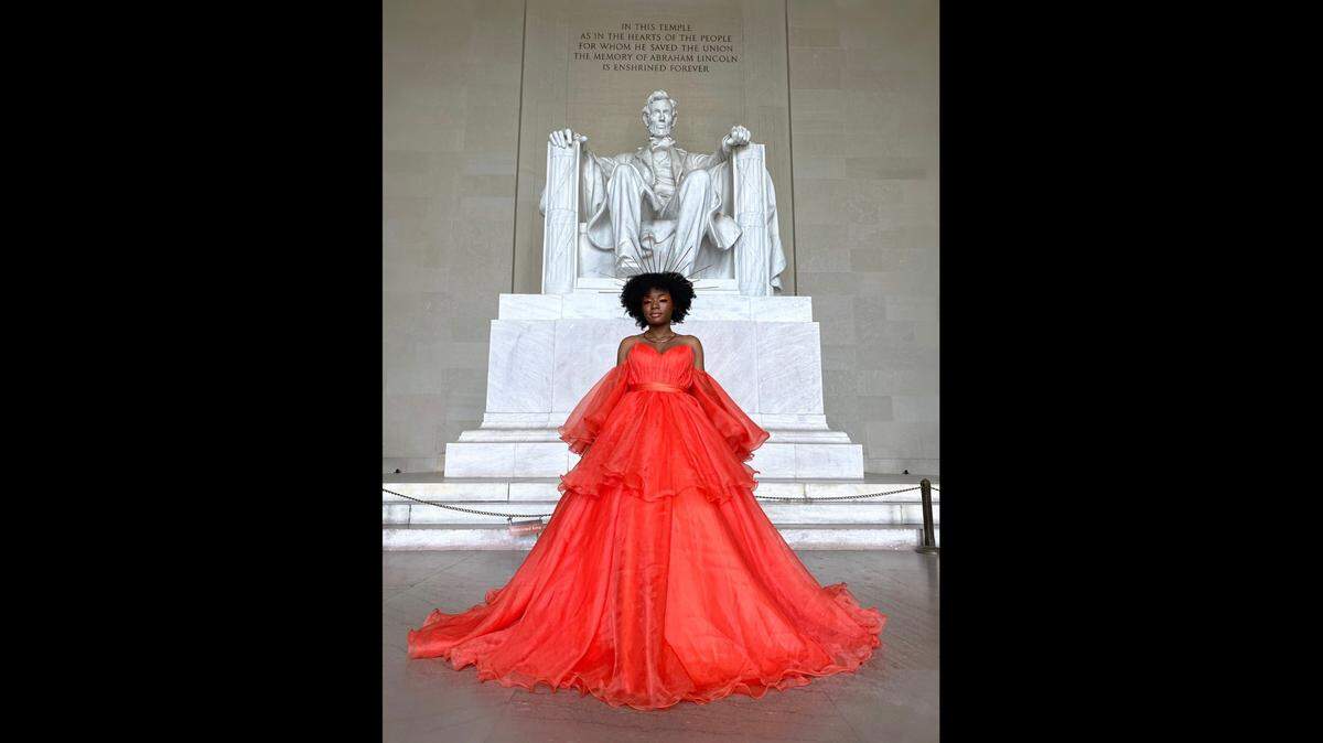 Maryland teen Jasmine Dauphine, 18, dazzled in her very own prom photo shoot in Washington D.C. after COVID-19 canceled the end-of-year dance.