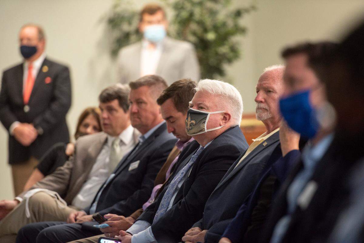 About half of attendees wear masks as Gov. Tate Reeves announces his appointments to the Governor’s Gulf Coast Advisory Committee at Diamondhead City Hall in Diamondhead to on Thursday, Aug. 12, 2021.