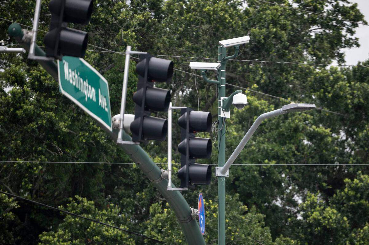 Cameras at the intersection of Bienville Boulevard and Washington Avenue in Ocean Springs on Tuesday, June 17, 2025. While Securix cameras no longer record license plates to cite uninsured vehicle owners, the Mississippi Department of Transportation has a live traffic camera at the intersection and there’s a Flock camera for public safety.
