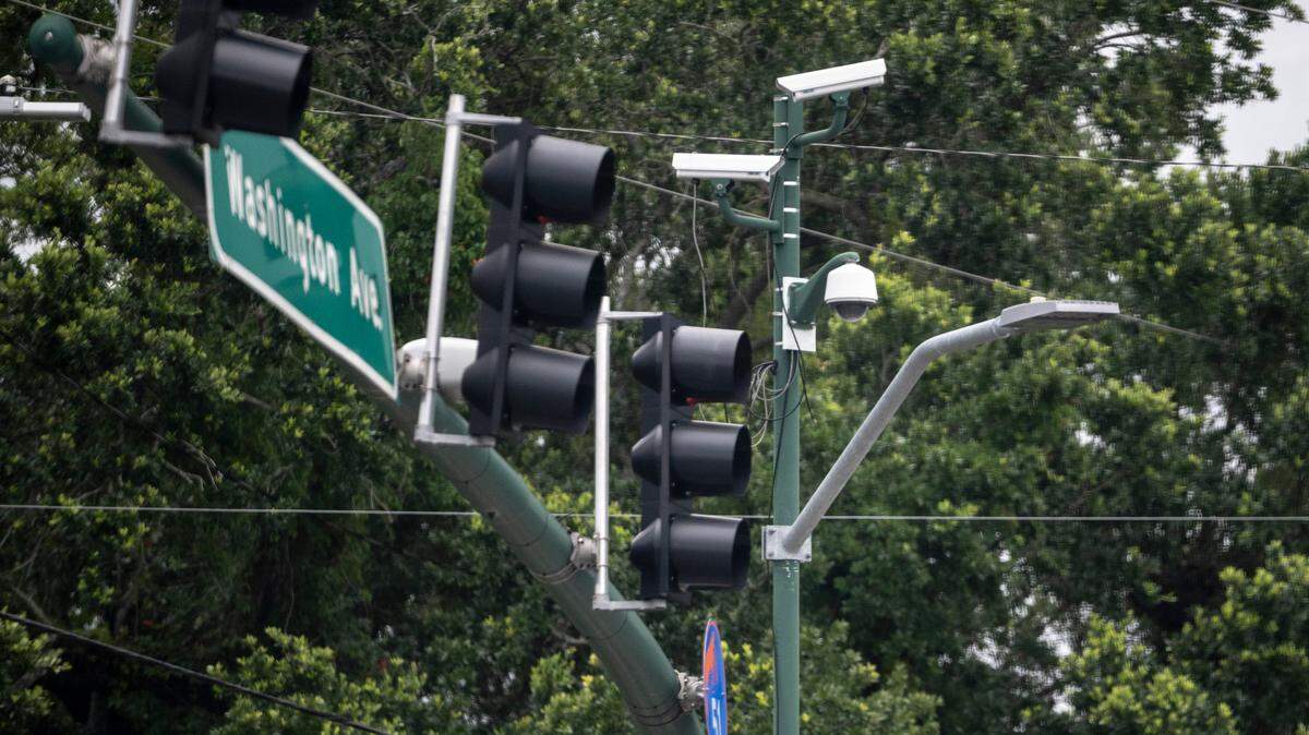 Cameras at the intersection of Bienville Boulevard and Washington Avenue in Ocean Springs on Tuesday, June 17, 2025. While Securix cameras no longer record license plates to cite uninsured vehicle owners, the Mississippi Department of Transportation has a live traffic camera at the intersection and there’s a Flock camera for public safety.