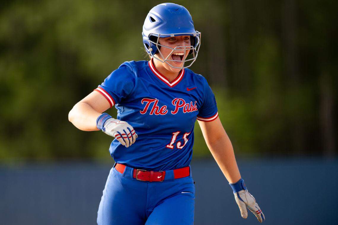 Pass Christian's Bristol Jones (15) celebrates as she scores a run in Friday’s win.