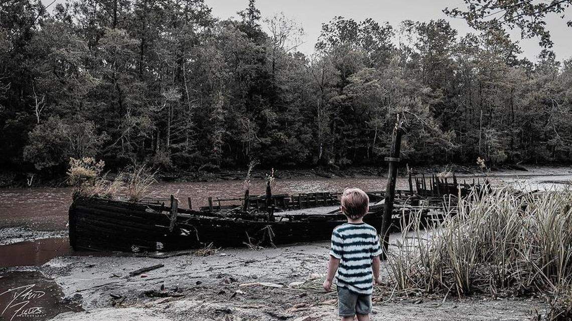 This mysterious boat was revealed by the storm surge unleashed by Hurricane Sally in Alabama in September 2020. David Fields took this photo while with his 4-year-old nephew, Hayden.
