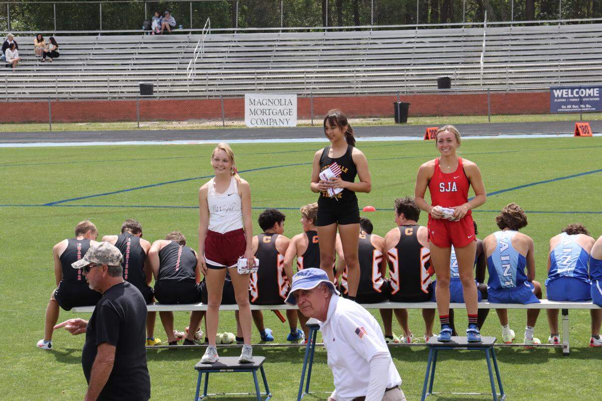 D’Iberville’s Julie Segroves placed first in the Mobile Challenge of Champions with a 13’ jump.