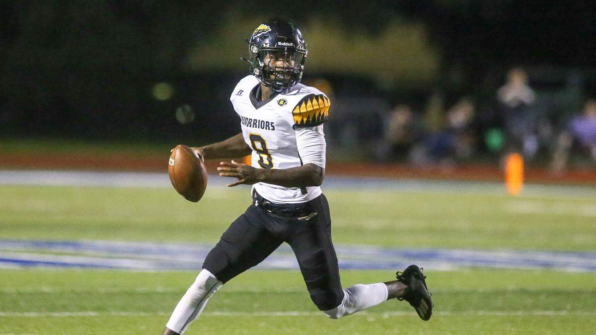 D’Iberville senior quarterback Dwight Williams looks to target a Warrior receiver against Ocean Springs Friday, Oct. 2, 2020.