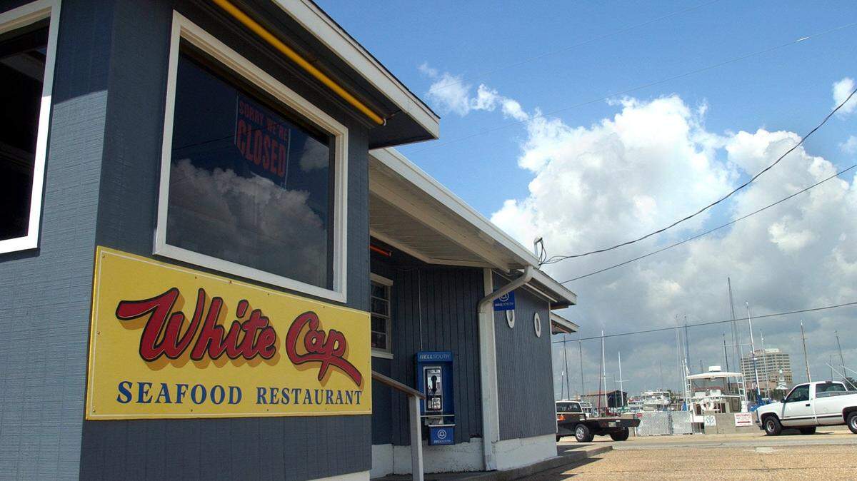 SUN HERALD FILE 
 Hurricane Katrina destroyed the old White Cap Seafood Restaurant at Gulfport Harbor, rebuilt at another location, but the city is hoping to negotiate a long-term lease for another restaurant on the site at the harbor's south end.
