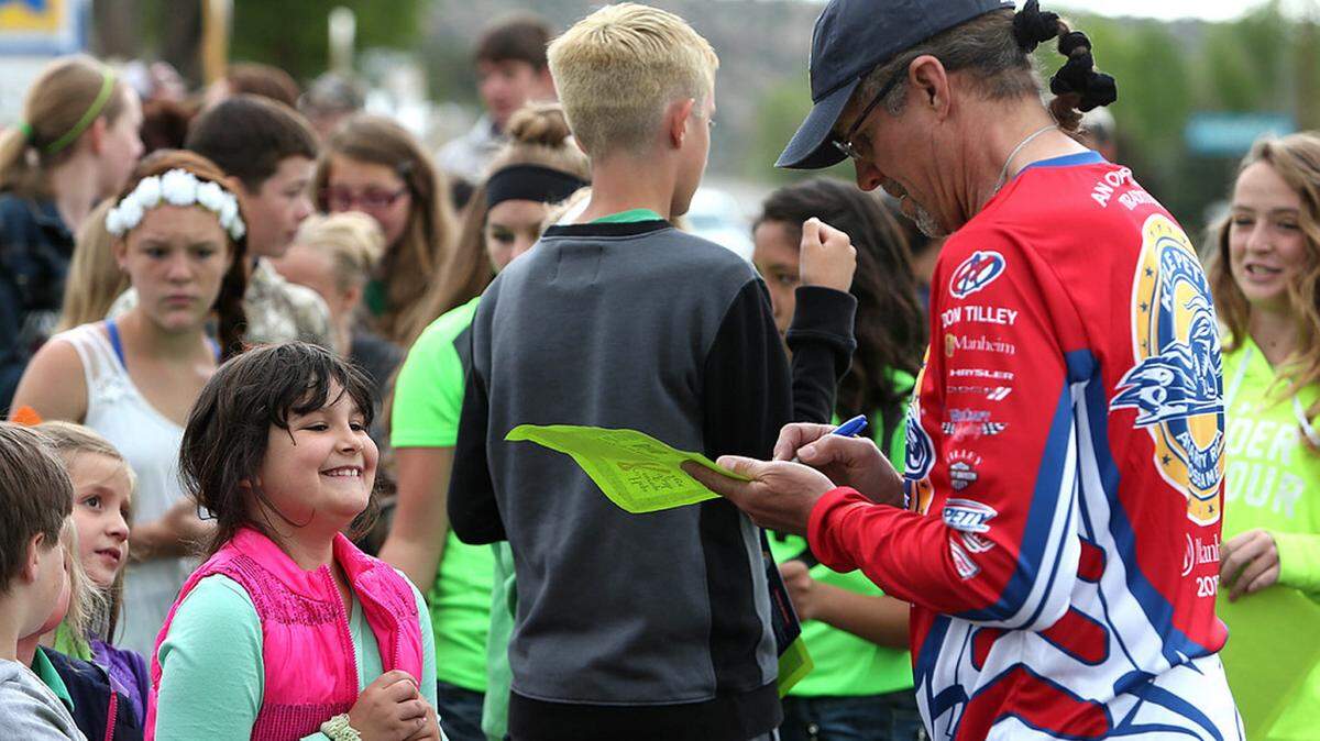 RIDE ACROSS AMERICA 
 Former NSACAR driver Kyle Petty signs autographs for young fans. He will lead the 22nd Ride Across America, a seven-day motorcycle trek, which will start in California Saturday and end May 6 in Biloxi on . Fans can meet Petty and other celebriy riders when they arrive at Beau Rivage Resort & Casino.