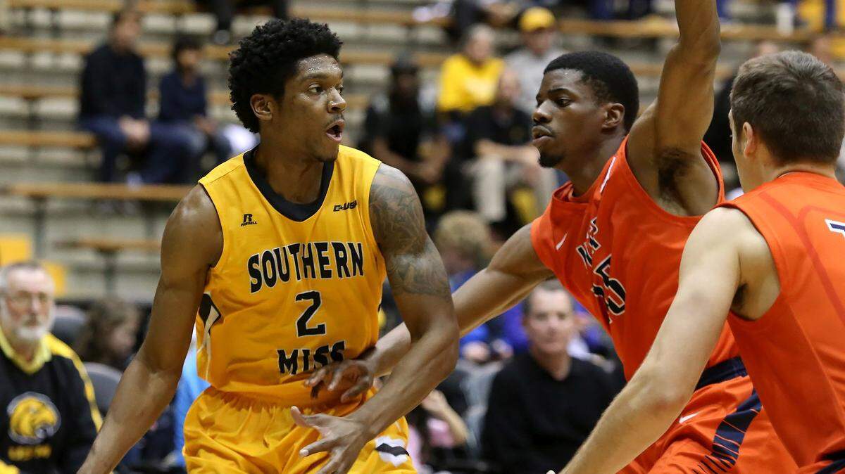 AMANDA McCOY/SUN HERALD 
 Southern Miss guard Kourtlin Jackson dribbles the ball while guarded by UTEP's Tevin Caldwell on Thursday, January 28, 2016, in Hattiesburg.