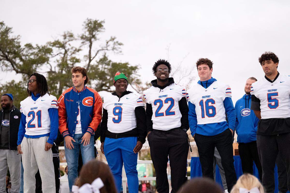 Gulfport players are brought on stage during the Champions Christmas Parade in Gulfport on Monday, Dec. 8, 2025.