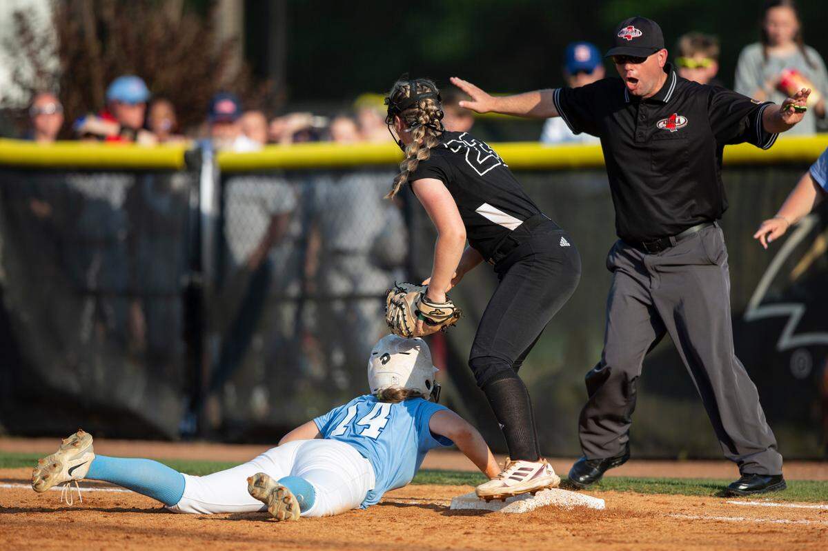 George County Lady Rebels’ Kyleigh Howell tries to tag out Saltillo’s Lynley Mccarley during the 5A 2023 MHSAA Softball Championship game at USM Softball Complex in Hattiesburg on Thursday, May 18, 2023.