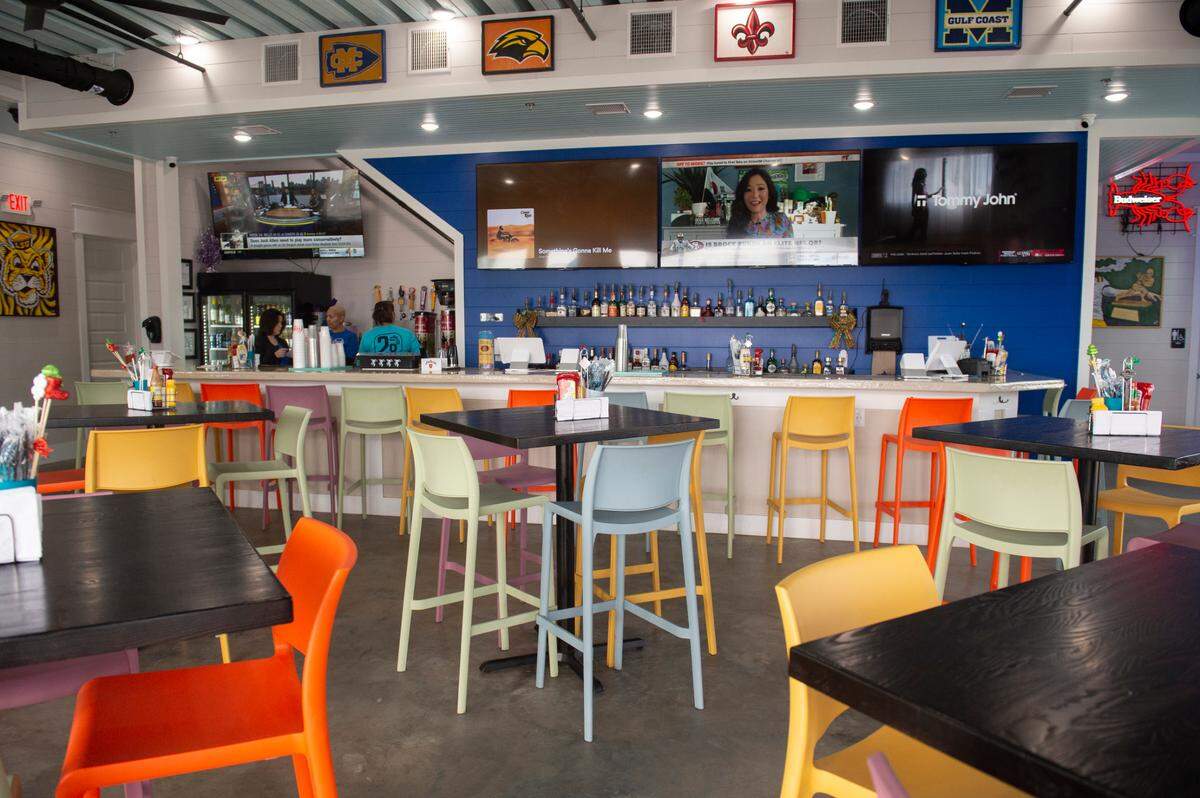 The first floor of Rags to Riches in Bay St. Louis on Thursday, Dec. 7, 2023. The two-story bar features a sports bar atmosphere on the first floor with bar food and a tropical cocktail menu.