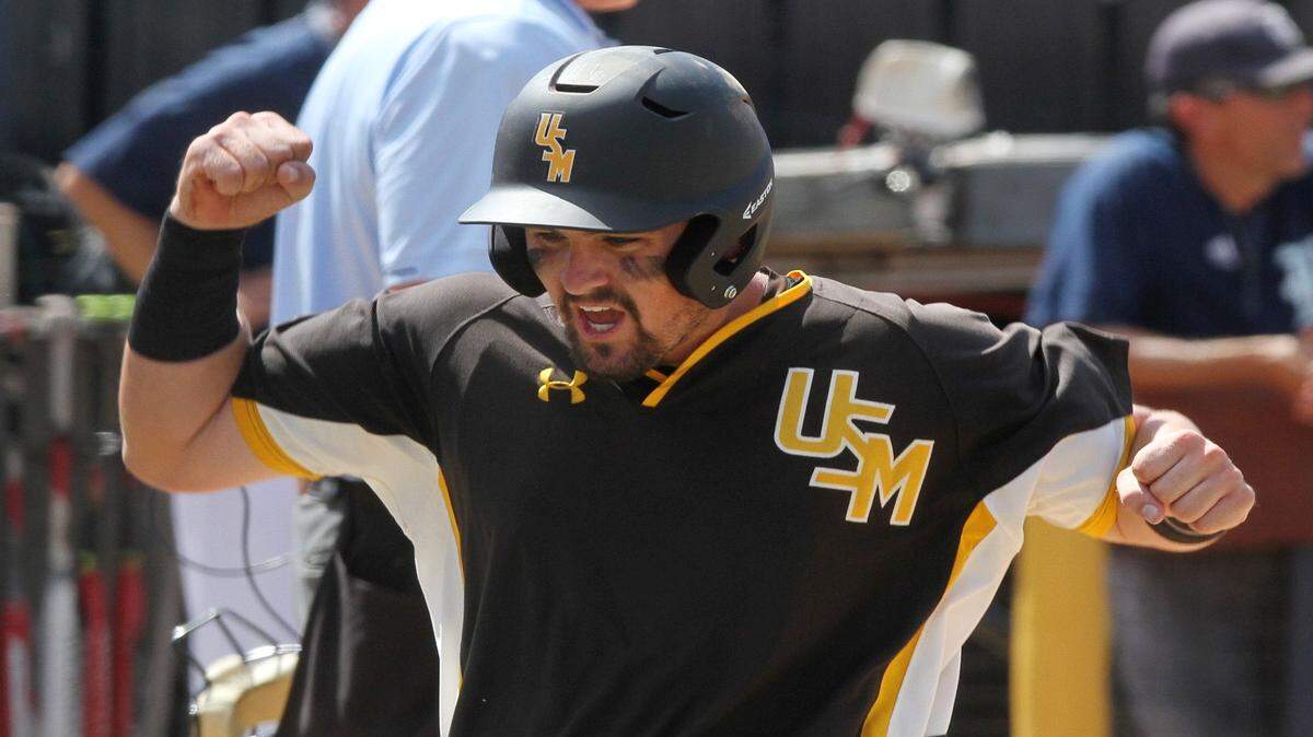 JOHN FITZHUGH/SUN HERALD 
 Southern Miss' Tim Lynch celebrates as he scores a run to give USM a 2-1 lead over Rice during the 8th inning of the C-USA championship game on Sunday May 29, 2016 at Pete Taylor Park in Hattiesburg. Lynch was selected in the ninth round of the MLB Draft by the New York Yankees.