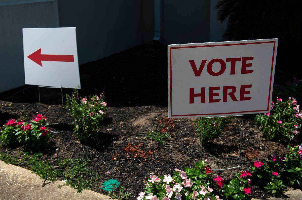 A voting sign outside First Presbyterian Church in Pascagoula during a runoff primary election for Mississippi’s Fourth District Congressional seat on Tuesday, June 28, 2022.