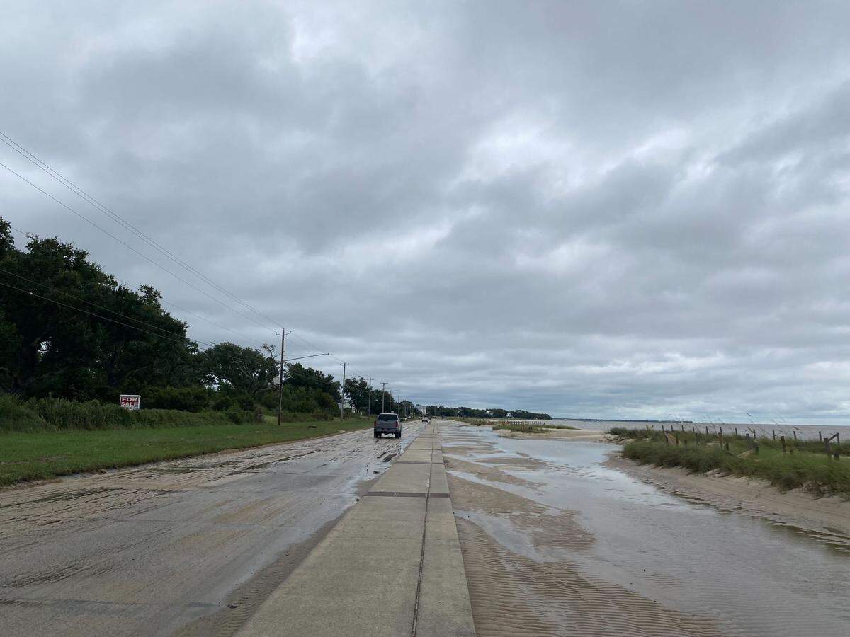 Beach Boulevard is wet and sandy Thursday, Sept. 12, 2024, from Bay St. Louis into Waveland.