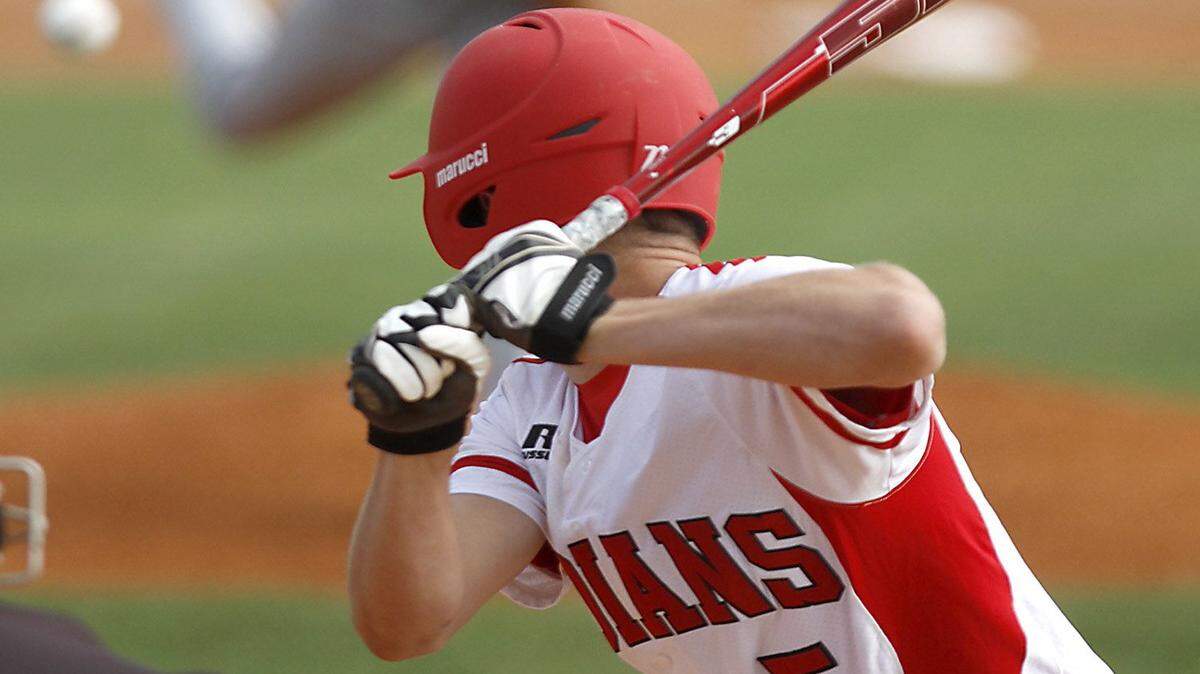 TIM ISBELL/SUN HERALD 
 Biloxi's Trey Shaffer watches the pitch of Long Beach hurler Josh Borzik during Futures All Star game last year. Biloxi will host an alumni game against D'Iberville on Friday.