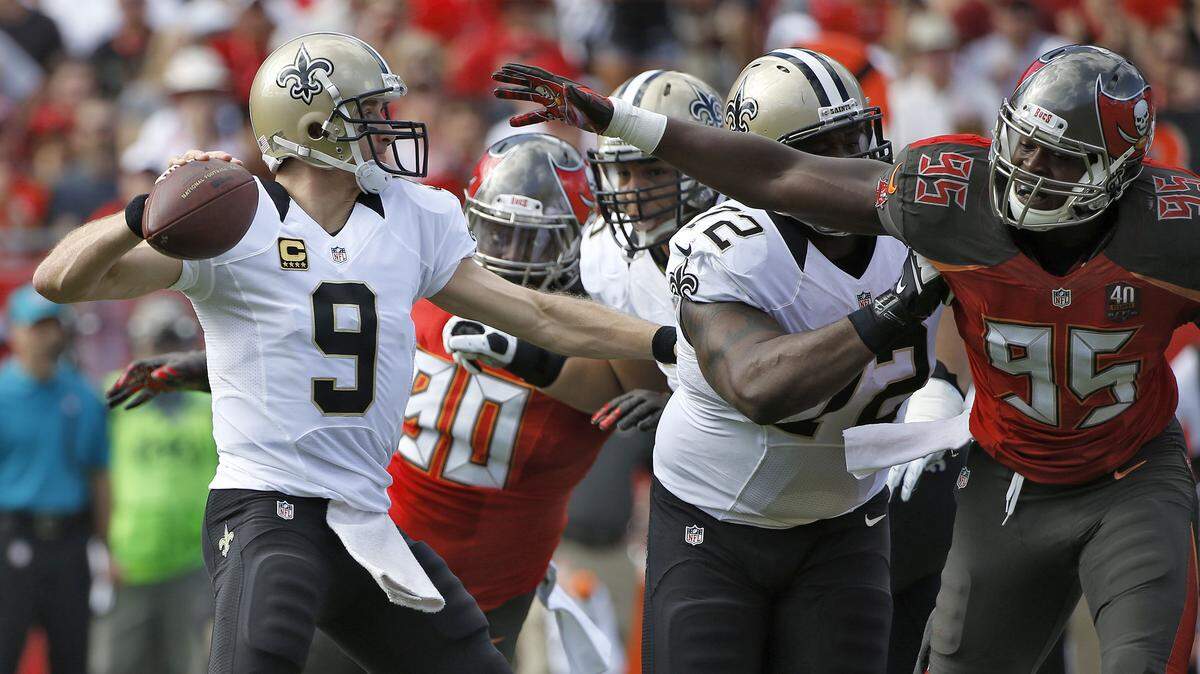 BRIAN BLANCO/ASSOCIATED PRESSTampa Bay Buccaneers defensive end Howard Jones (95) tries to get New Orleans Saints quarterback Drew Brees (9). The Saints host Detroit tonight at the Mercedes-Benz Superdome.