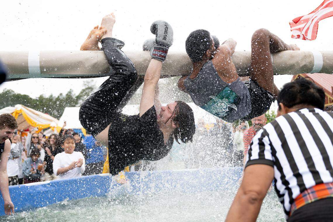 Attendees participate in Thai water boxing during Songkran at the Wat Buddhametta Mahabaramee in Gautier on Sunday, April 19, 2026.