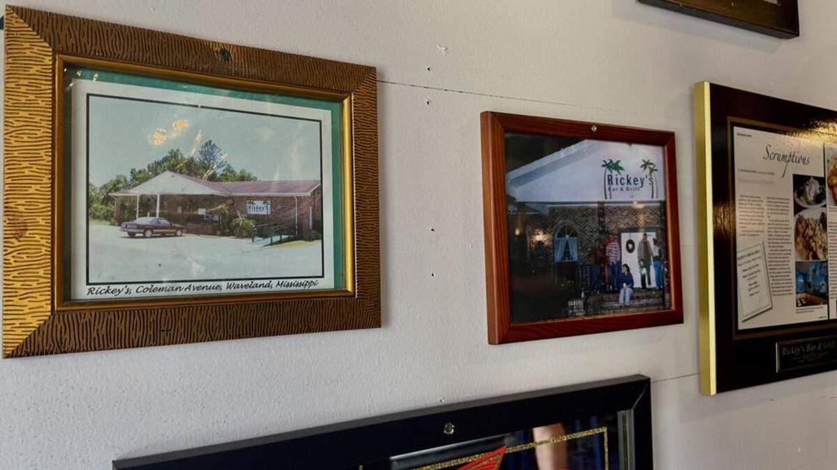 A wall at Rickey’s on Coleman is lined with old photographs and newspaper clippings.
