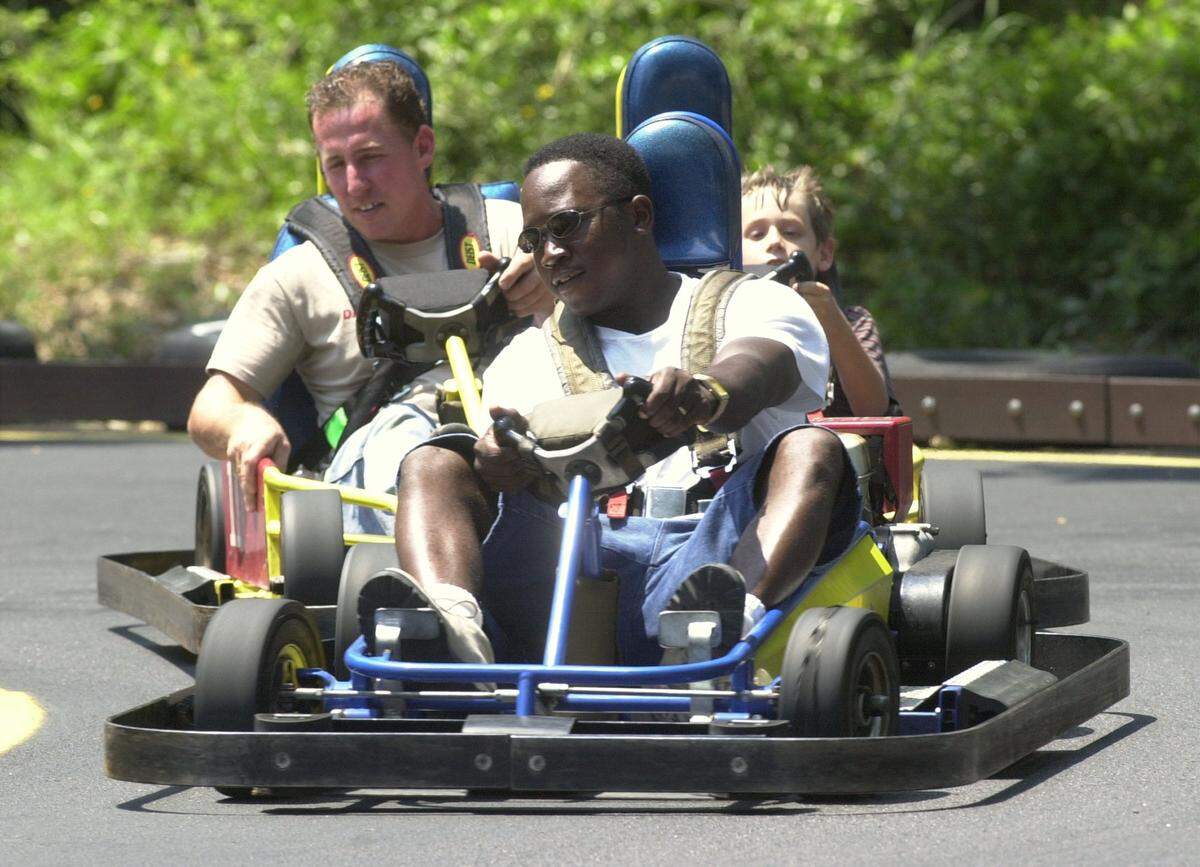 In this 2001 file photo, visitors race on the go-kart track at FunTime USA in Gulfport. The amusement park was destroyed by Hurricane Katrina, but the owners are still working to bring it back.
