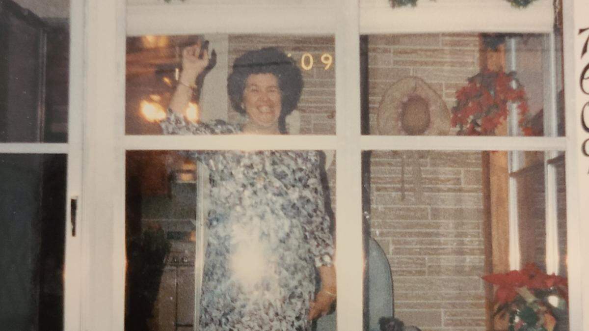 Mattie “Linda” Cunningham stands in her favorite spot, her front porch in Escatawpa, where she waved to passerby by on the highway for most of her 75 years.