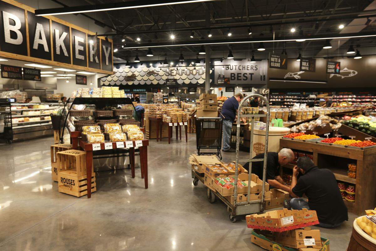 Workers prepare the new Rouses Market in Gulfport for the grand opening Wednesday, June 12, 2019.