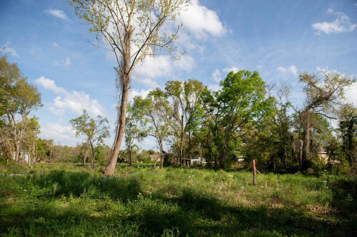 A plot of land between St. Francis, Sycamore and Washington Streets in Bay St. Louis on Tuesday, March 29, 2022. Corr hopes to develop the land into eight different single-family homes.