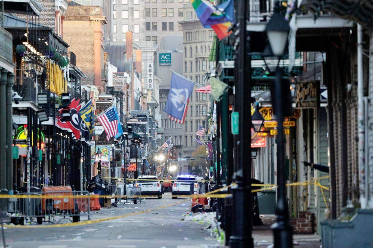Bourbon Street in New Orleans sits empty Wednesday, Jan. 1, 2025, after a morning attack claimed the lives of 14 partygoers.